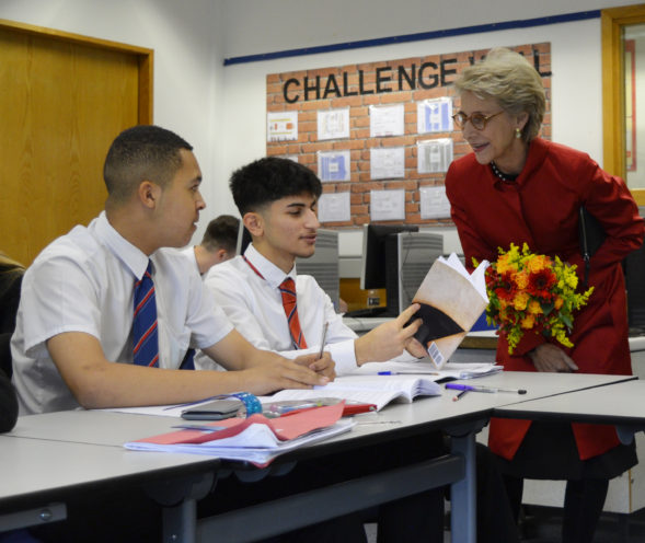 HRH The Duchess of Gloucester speaking with students in an English session